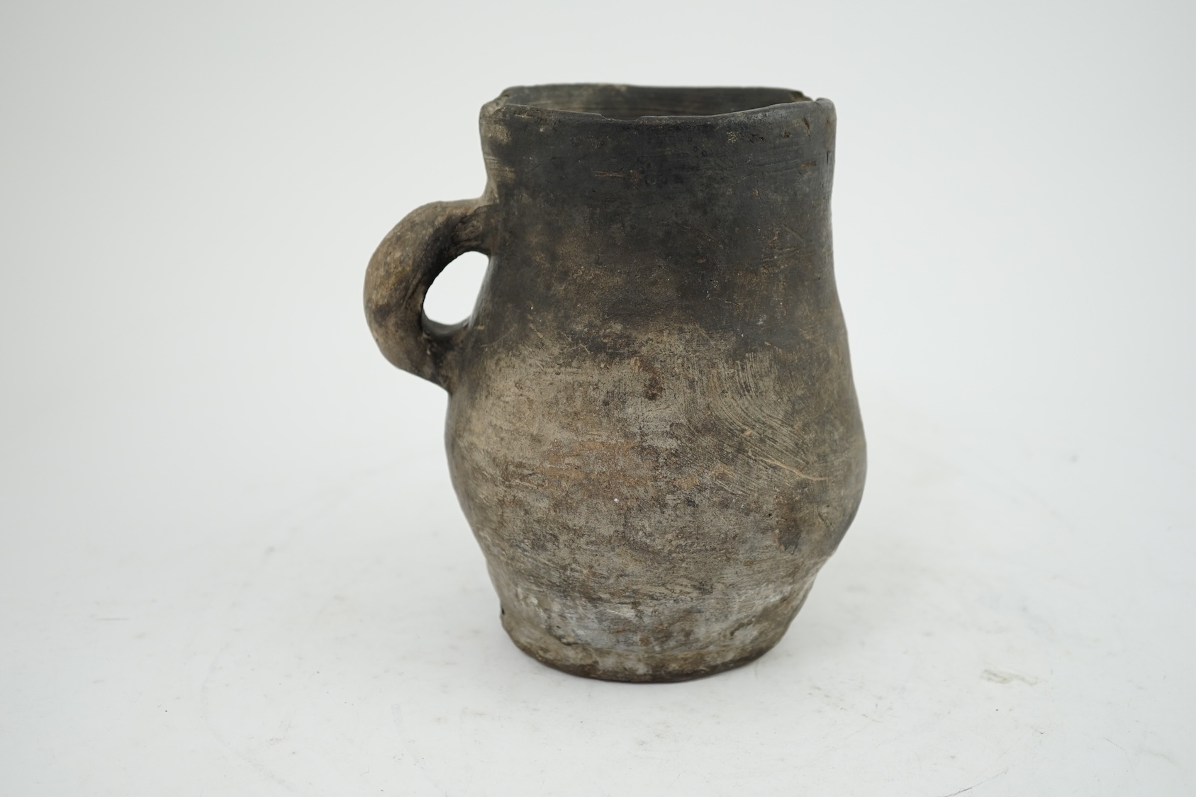 An archaic pottery jug, Iron Age, excavated in Britain